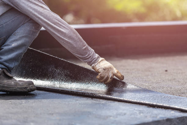 Professional Exterior Waterproofing technician working in Manilla, IN